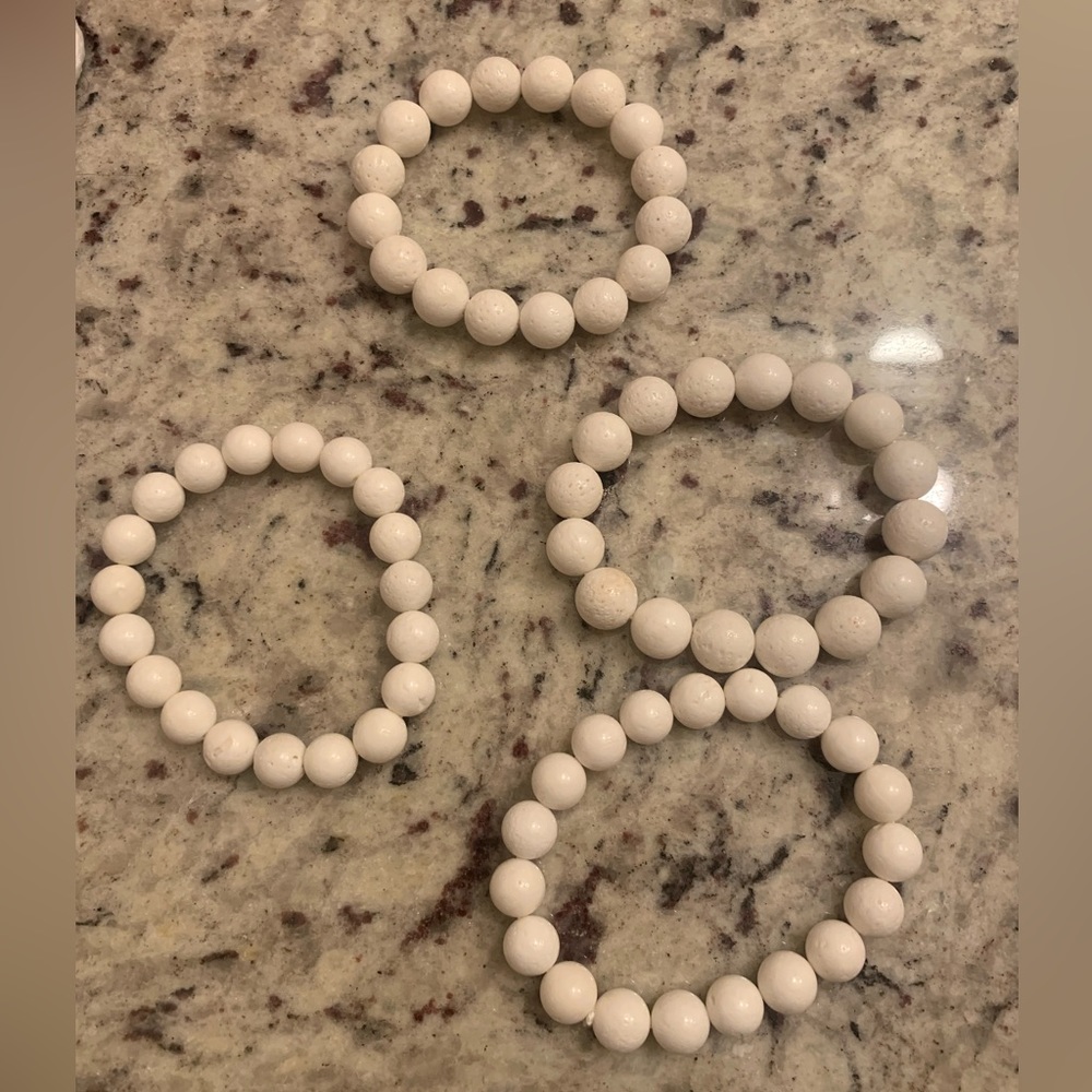 Four White Beaded Bracelets - Picture 1 of 1
